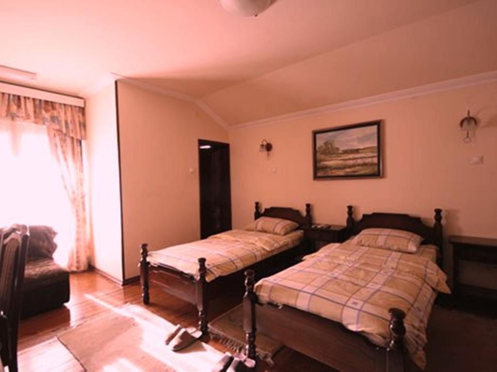 Hotel Ambiente بودغوريتْسا الغرفة الصورة